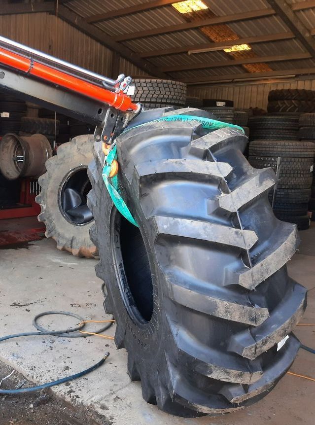 Truck Tyre being picked up with forklift — Tyres in Murwillumbah, NSW