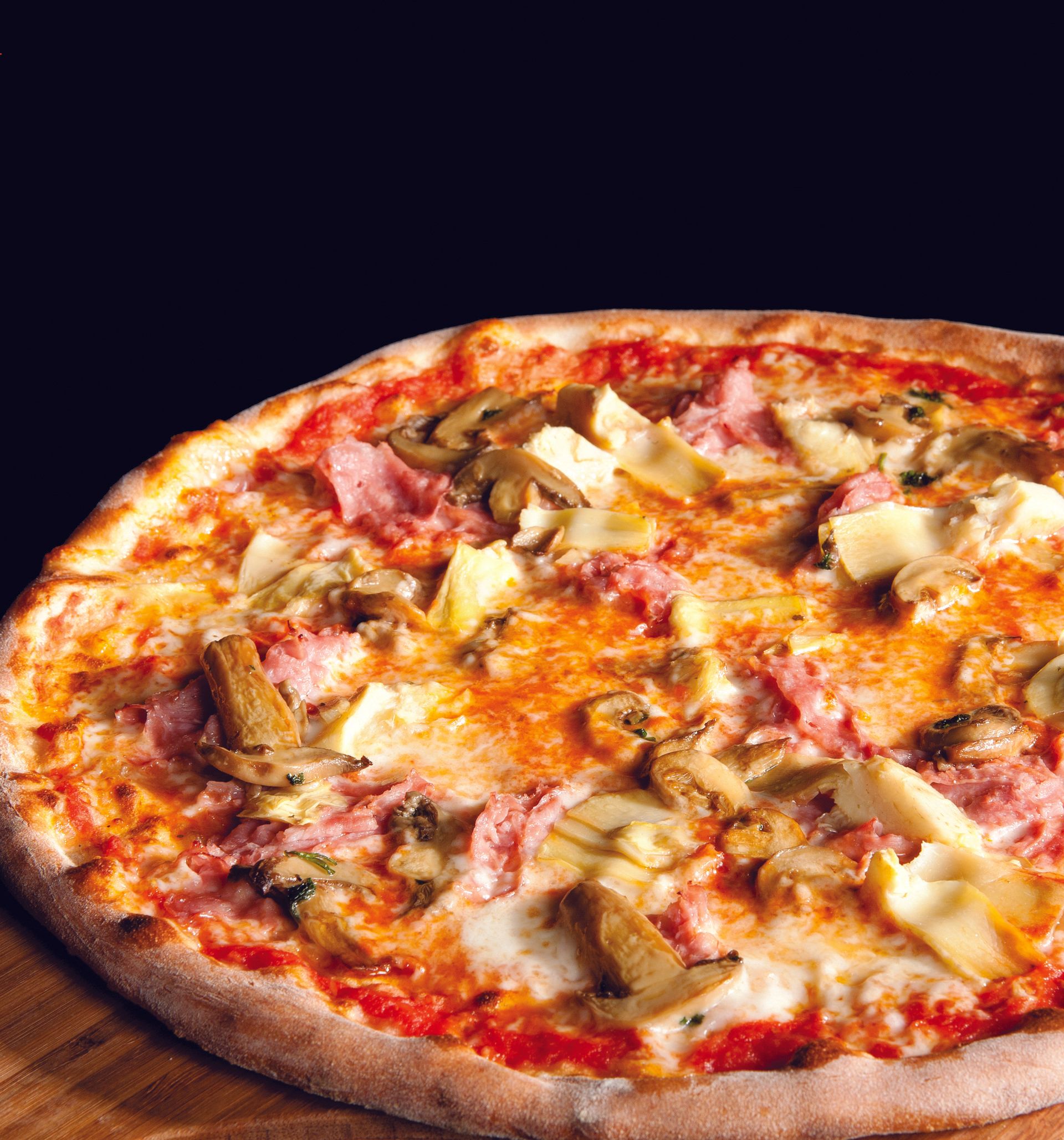 A pizza with mushrooms and artichokes on it