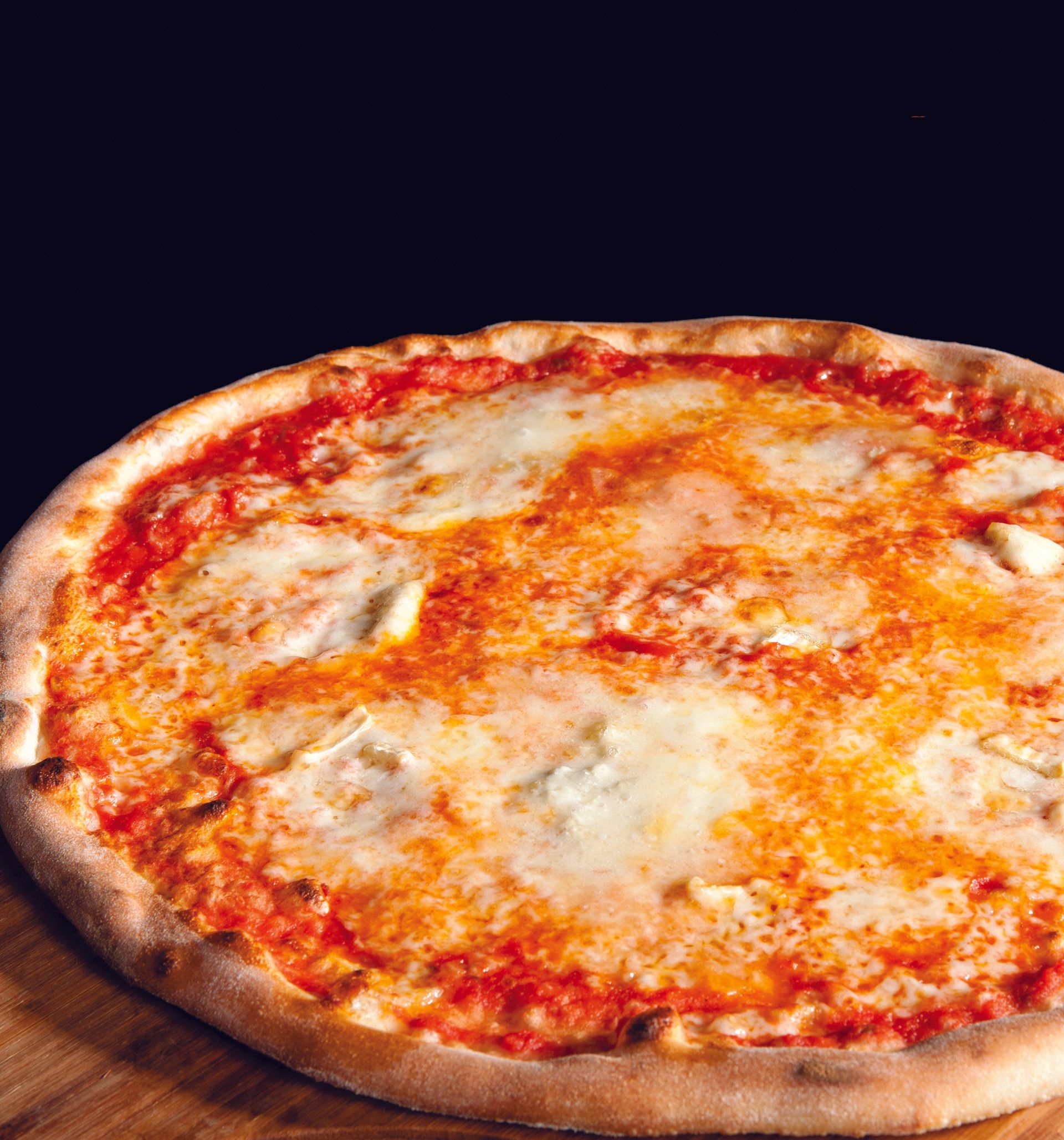 A pizza with a lot of cheese on it