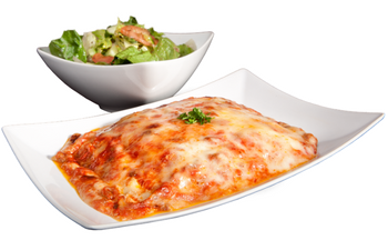 A plate of lasagna next to a bowl of salad