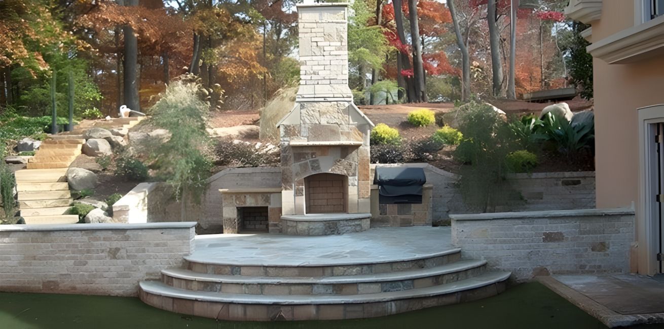 backyard-makeover-landscape-design-outdoor-fireplace-patio-kitchen-masonry-walls-patio-
company-roswell-ga