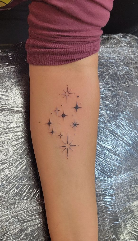 Fine Line Stars Tattoo