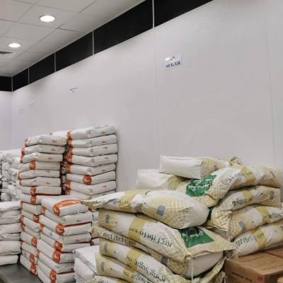 A bunch of bags are stacked on top of each other