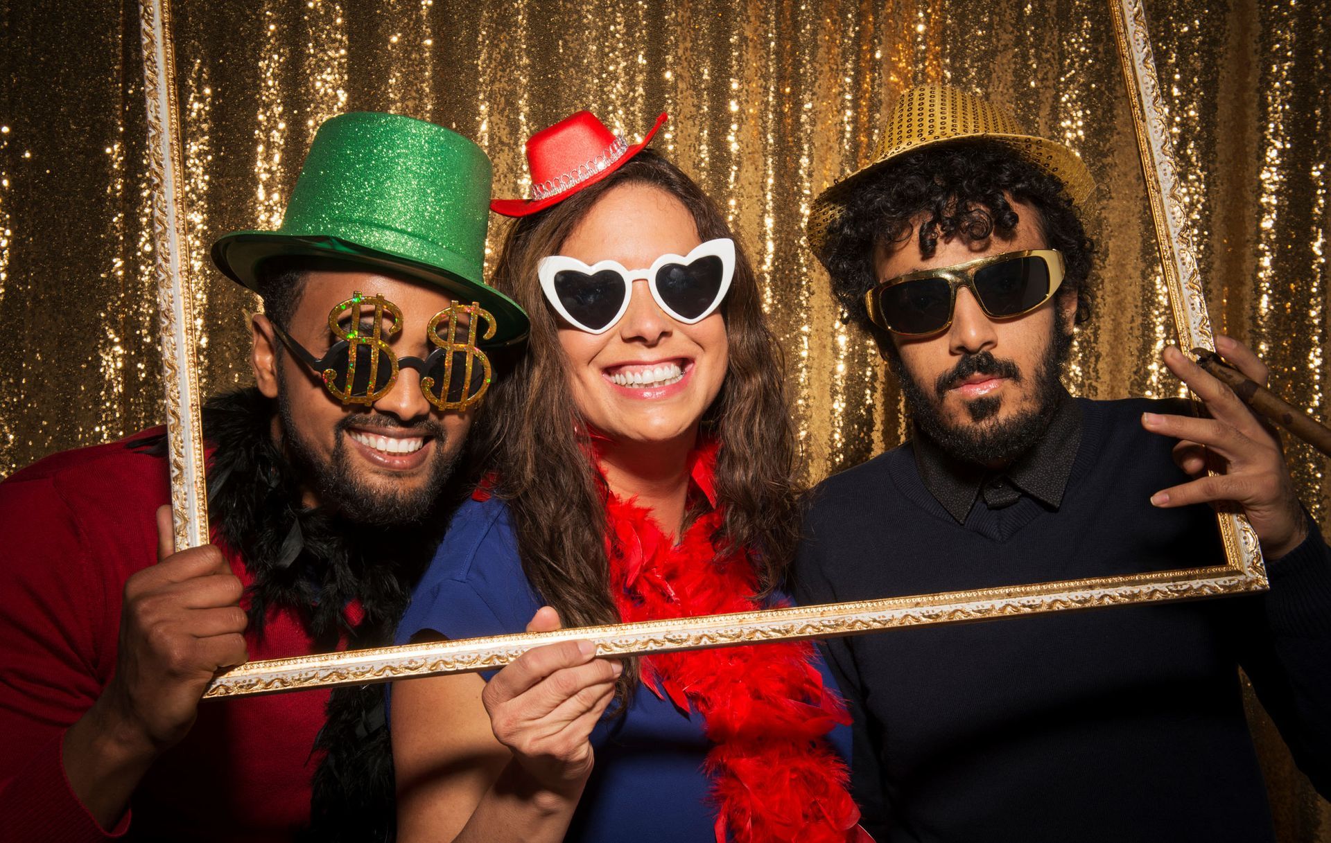 Male and female friends taking funny photo in party.