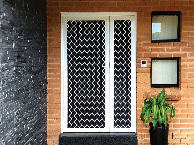 diamond grillle front hinged door with sidelight panel canberra