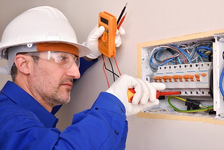 Installing Electrical Panel — Ogden, IL — MX Electric