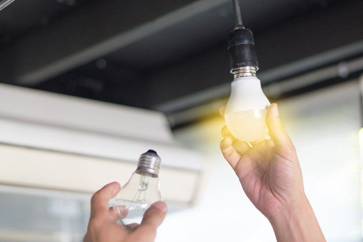Installing the Light Bulb — Ogden, IL — MX Electric