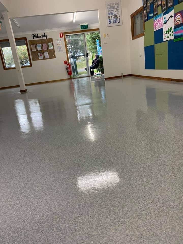 A Large Room With a Shiny Floor and a Door — Doobies Cleaning Service in Port Macquarie, NSW