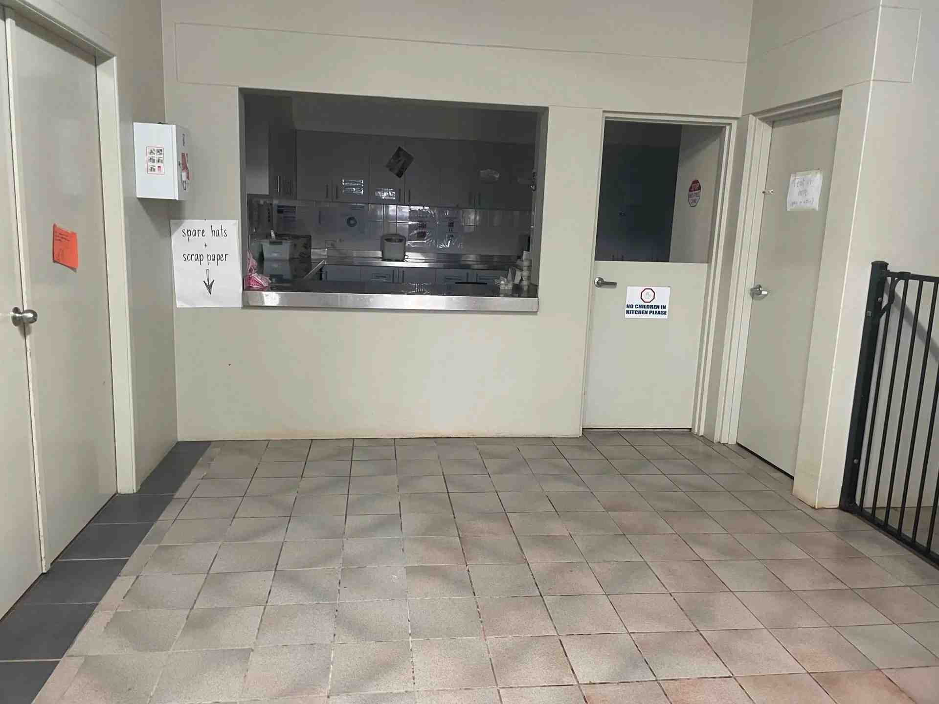 An Empty Room With a Tiled Floor and a Window — Doobies Cleaning Service in Port Macquarie, NSW