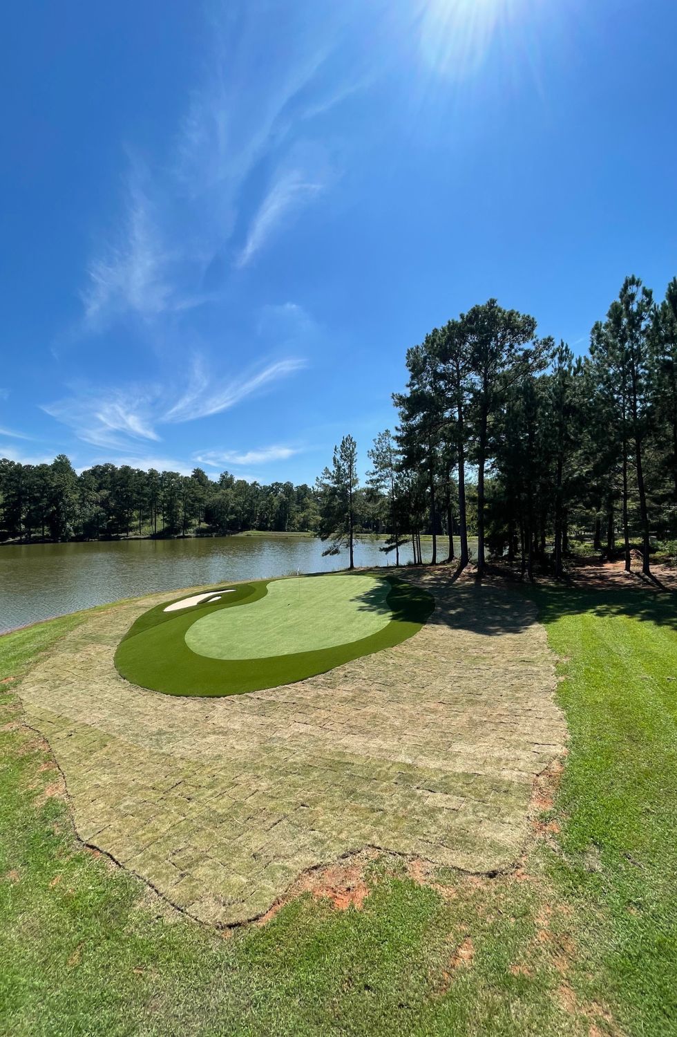 new sod on ground around golf course green