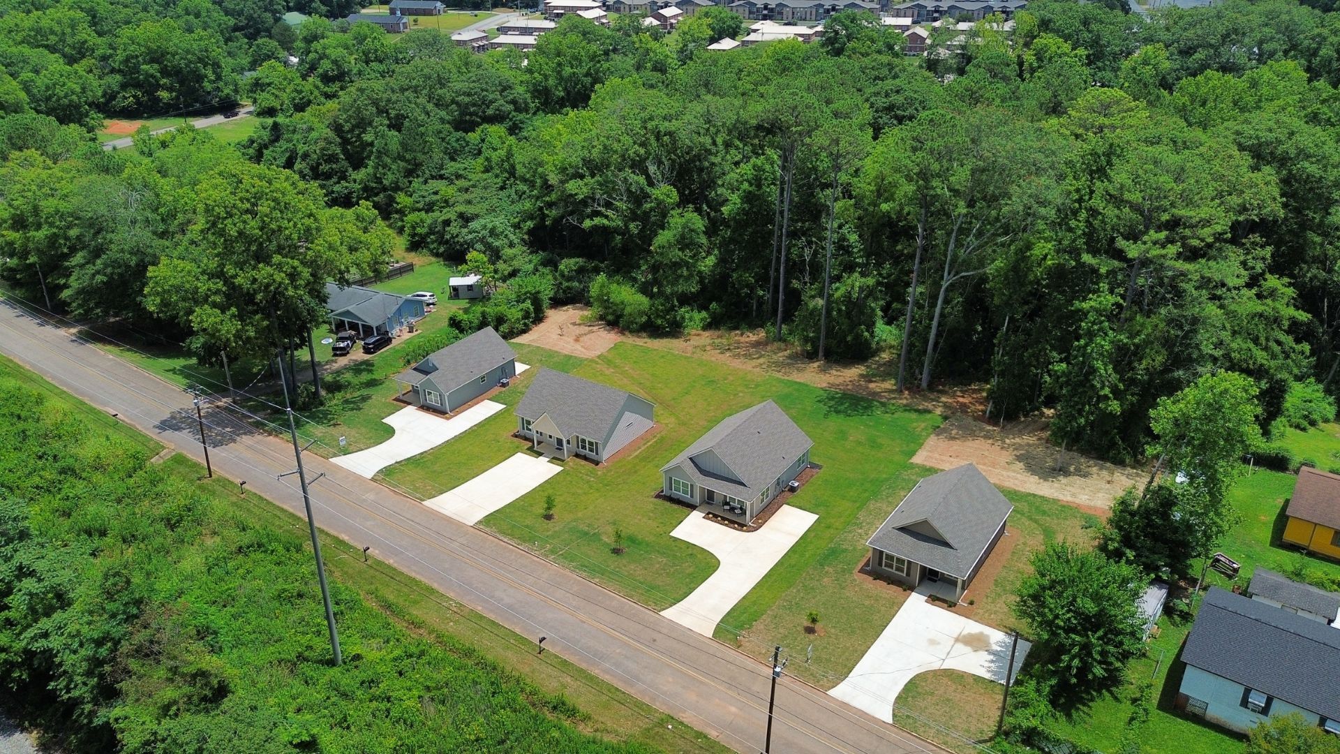 drone pic of new houses with landscaping