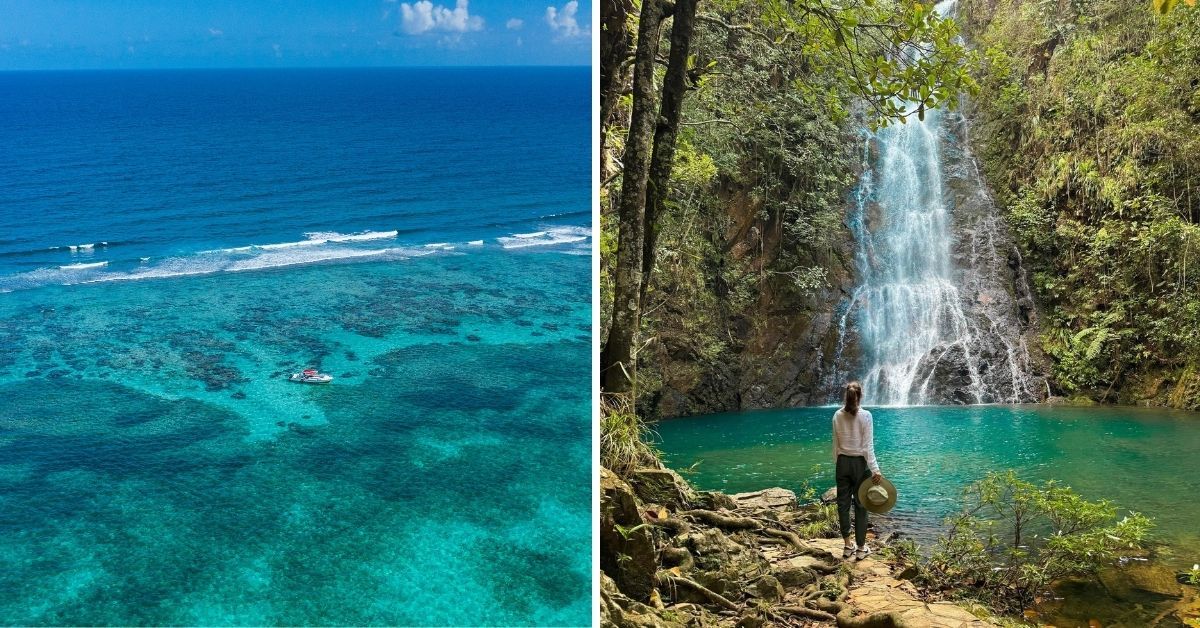 A woman is standing in front of a waterfall next to a body of water.