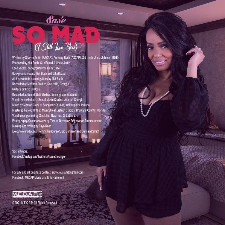 Woman, Sasé, in black dress, on album cover. Text: