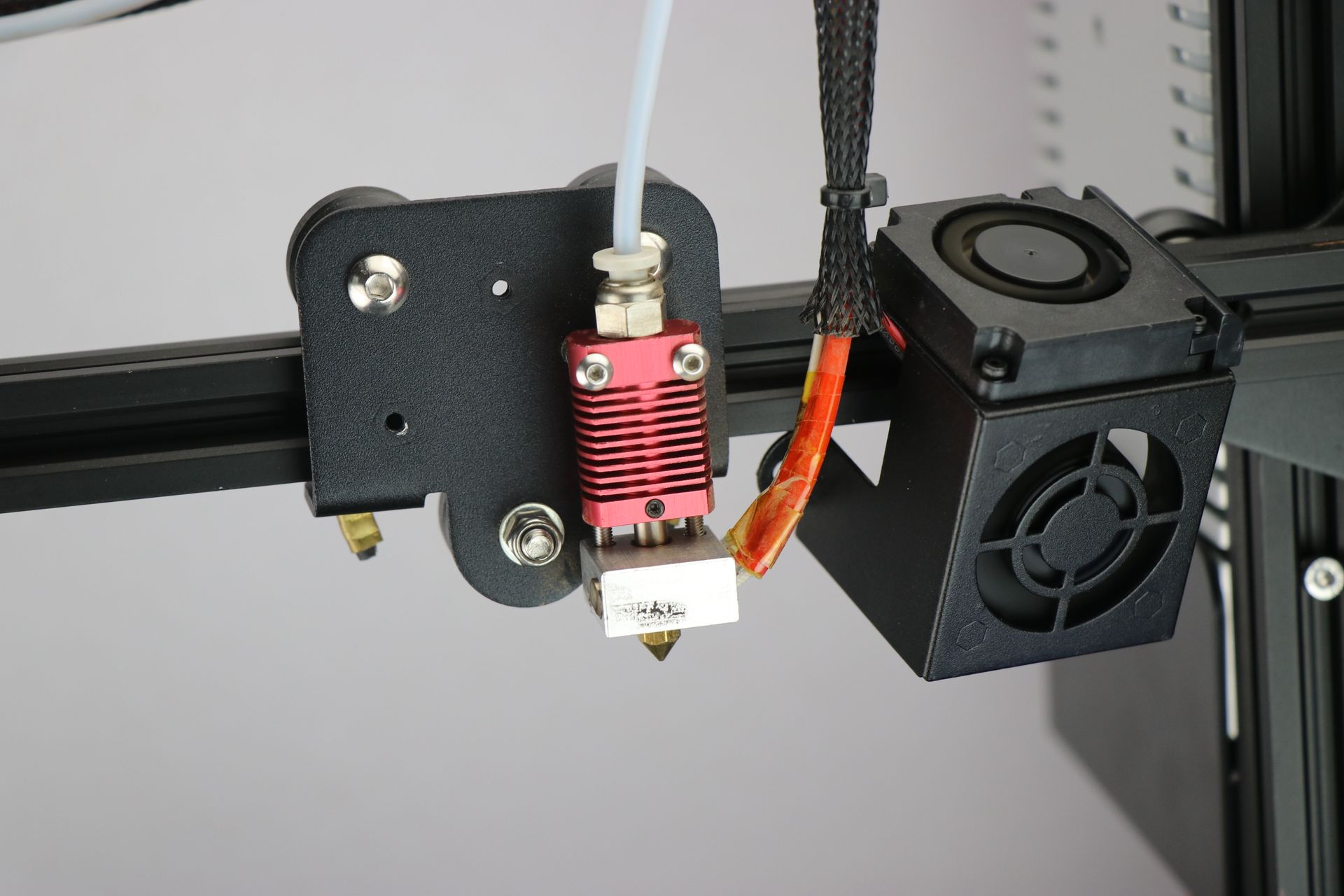 A 3d printer with a fan attached to it