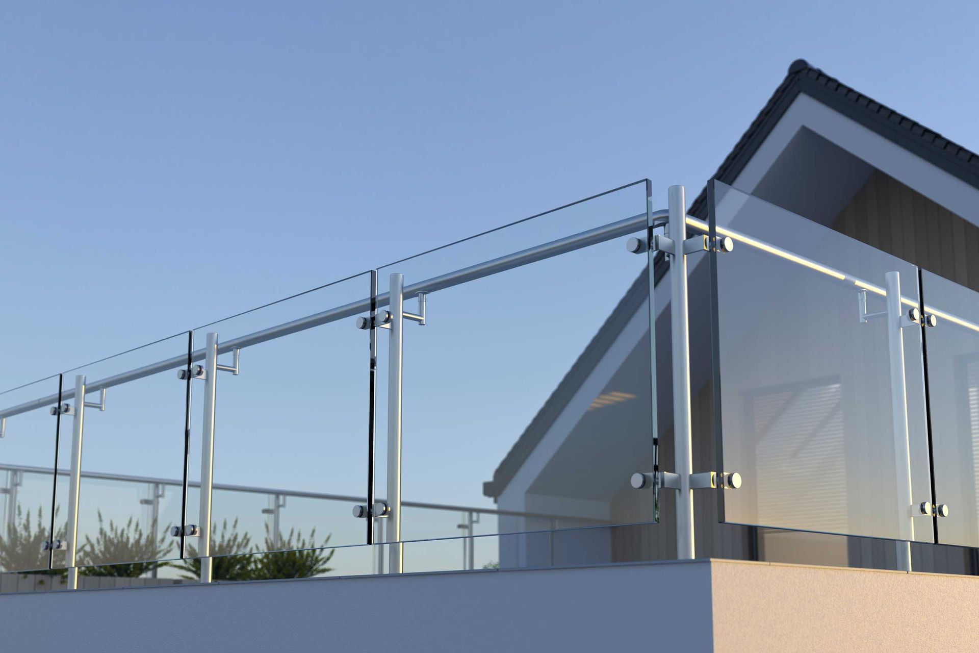 Modern stainless steel railing with glass balustrade on a house.