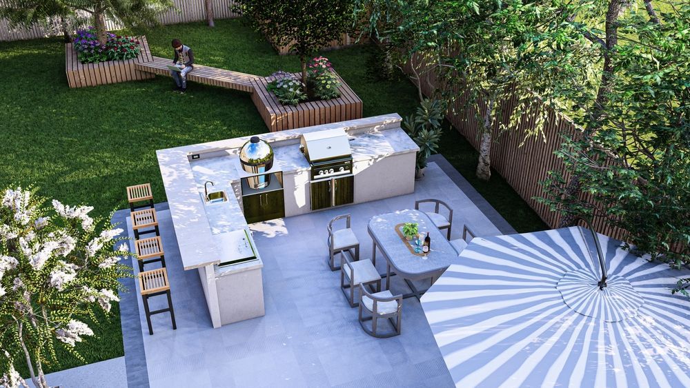 Outdoor patio with white bar, seating, and large striped umbrella in a landscaped backyard.