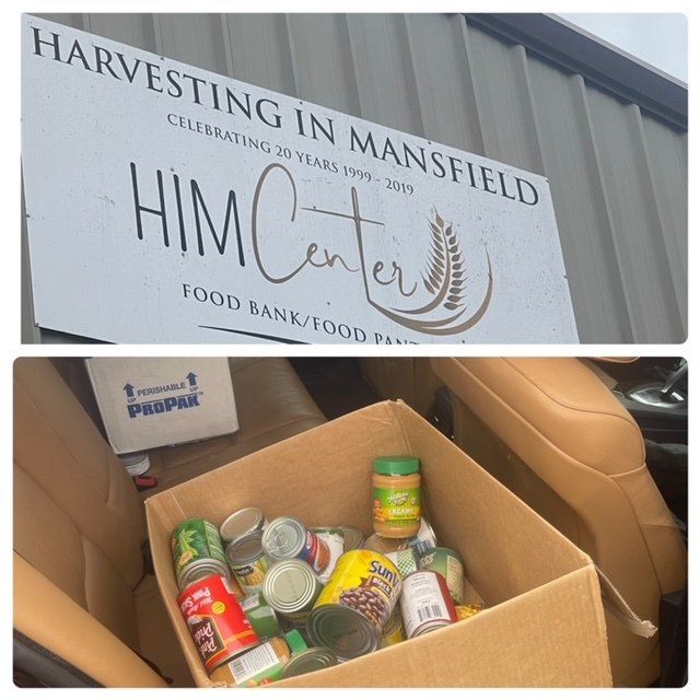 Sign for HIM Center food bank and a car interior with a box of donated canned goods.