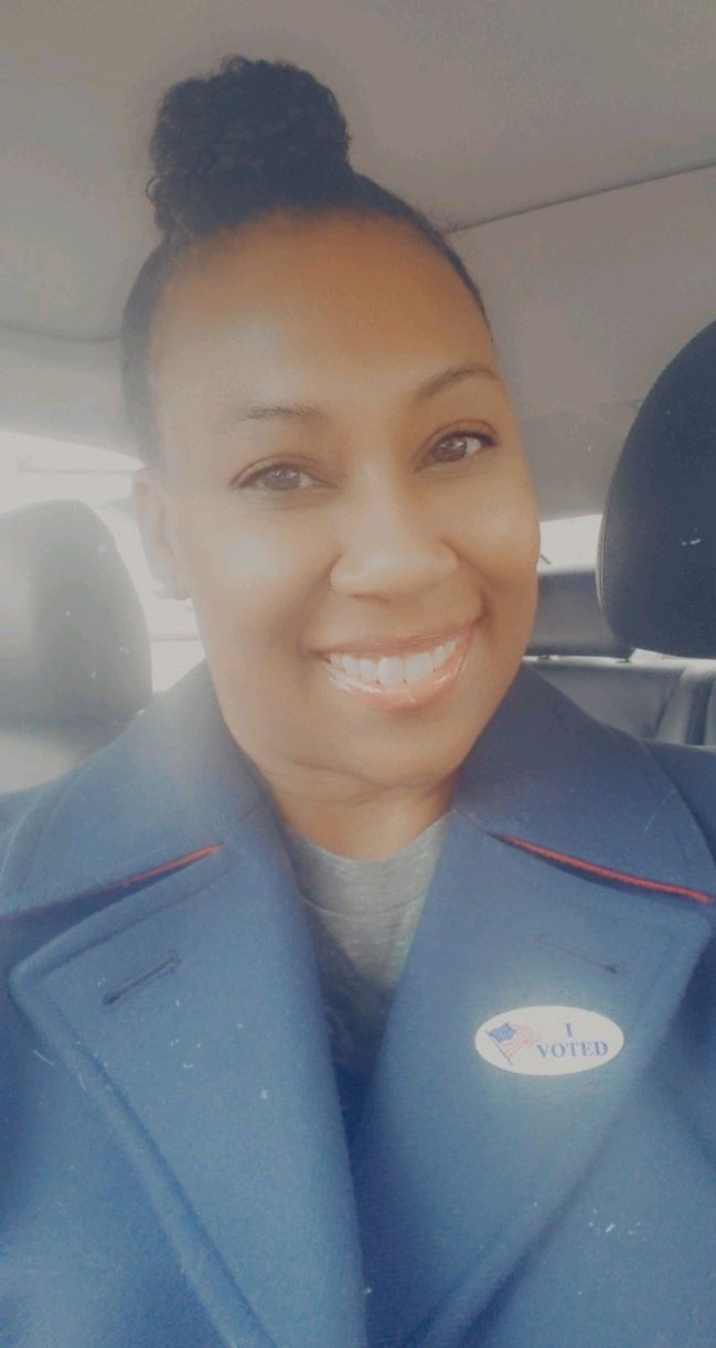 Woman in blue coat with 