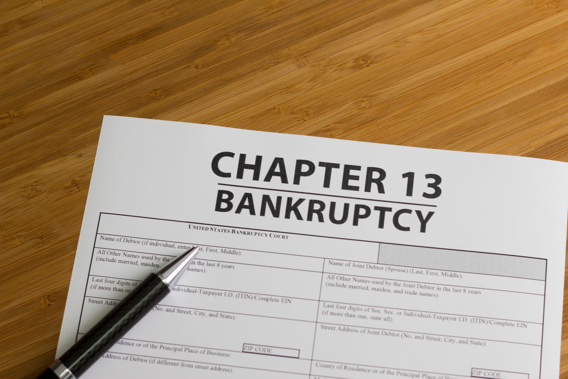 A bankruptcy Chapter 13 document on a bankruptcy lawyer's desk.
