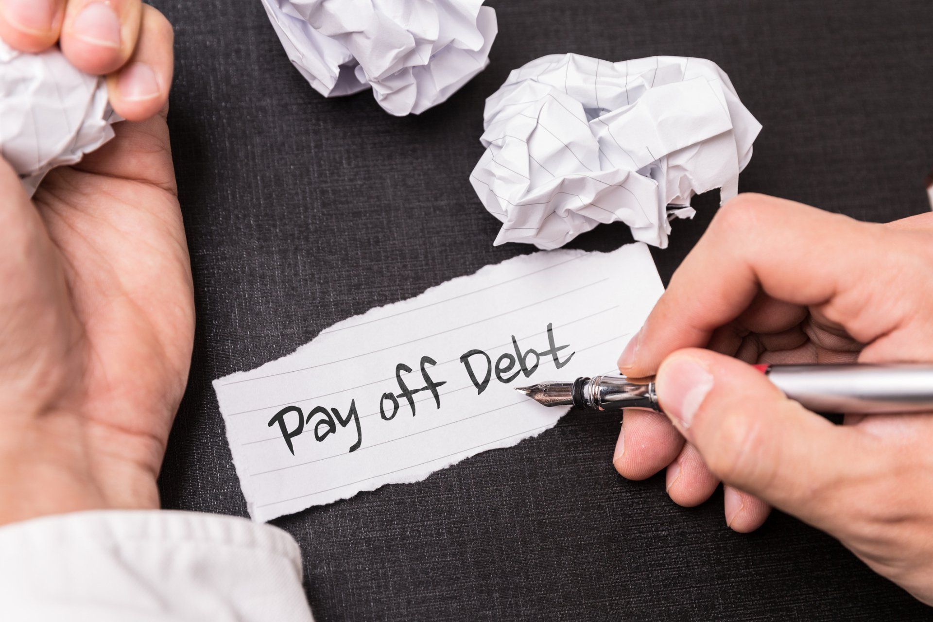 Chapter 7 Bankruptcy — Pay off Debt Word in Paper in Valdosta, GA
