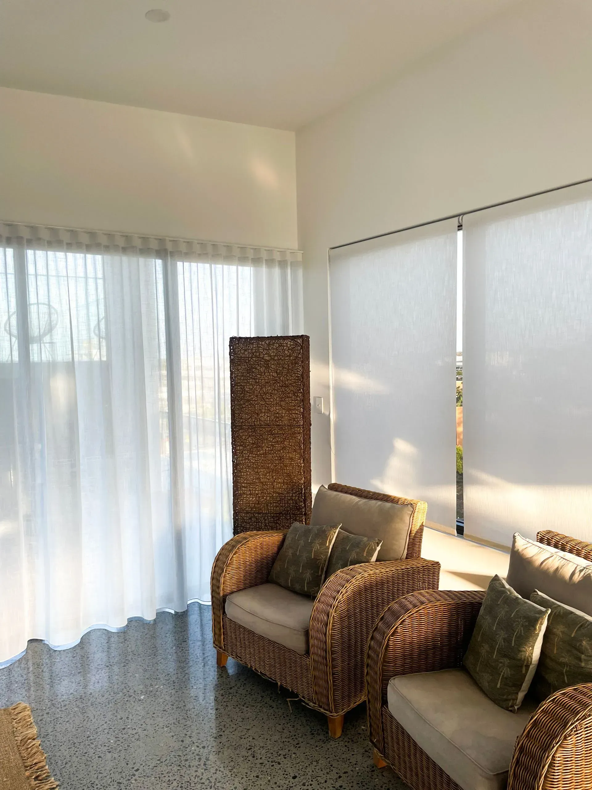Living Room With Wicker Furniture And White Curtains — Creative Curtains & Blinds In Tweed Heads South, NSW