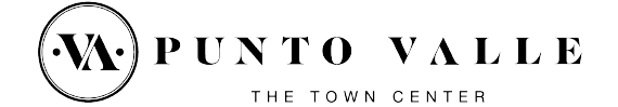 Logotipo de Punto Valle con el eslogan “The Town Center” en texto negro sobre fondo blanco.