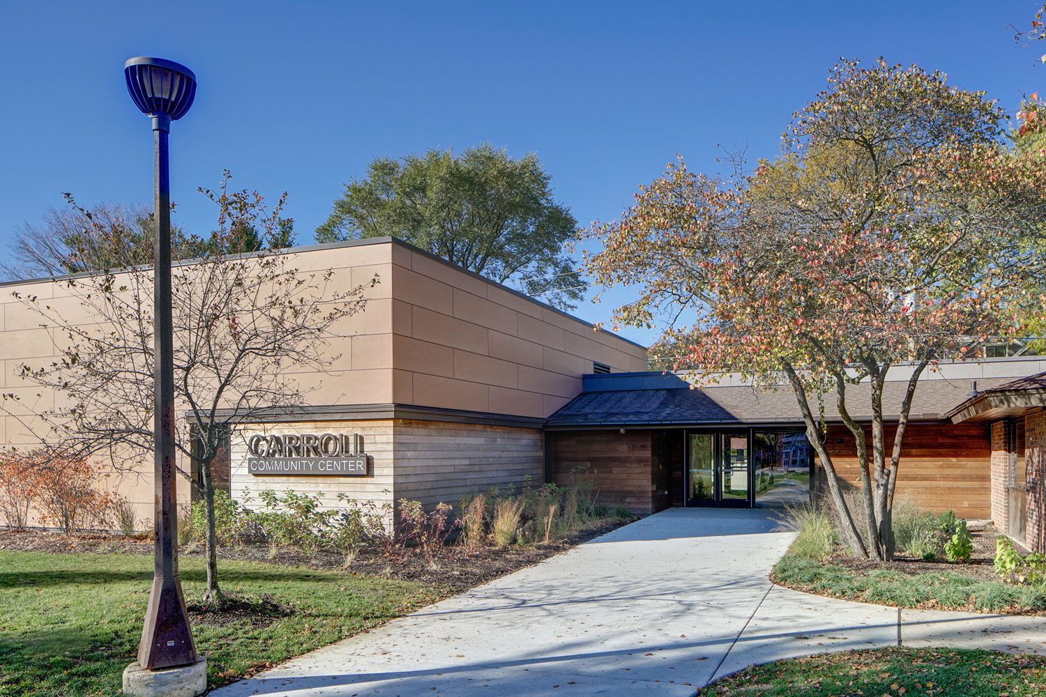 A large building with a sign that says cornell on it