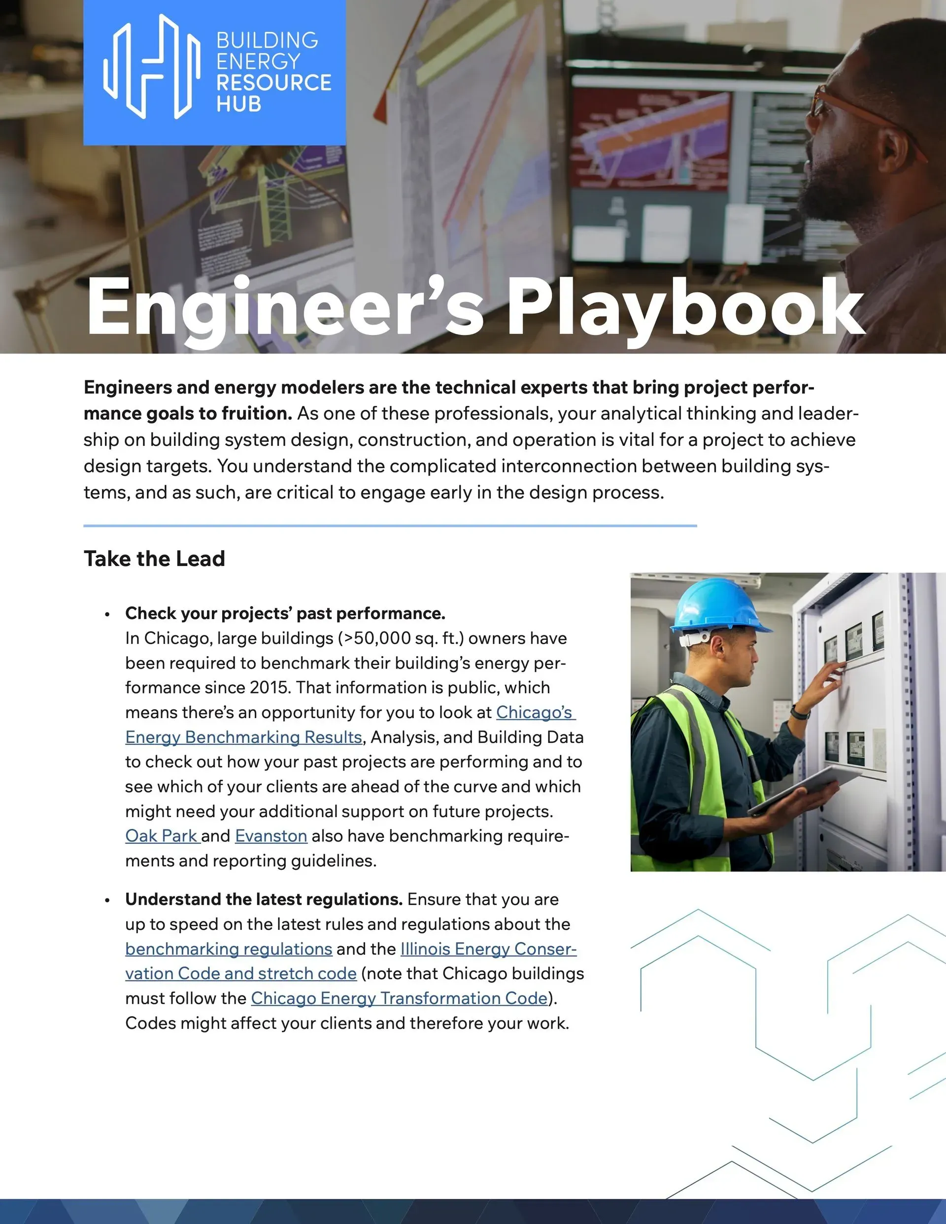 A man is working on a computer in an engineer 's playbook.