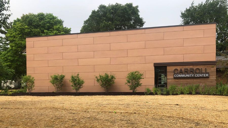 A large building with a sign that says cargill community center