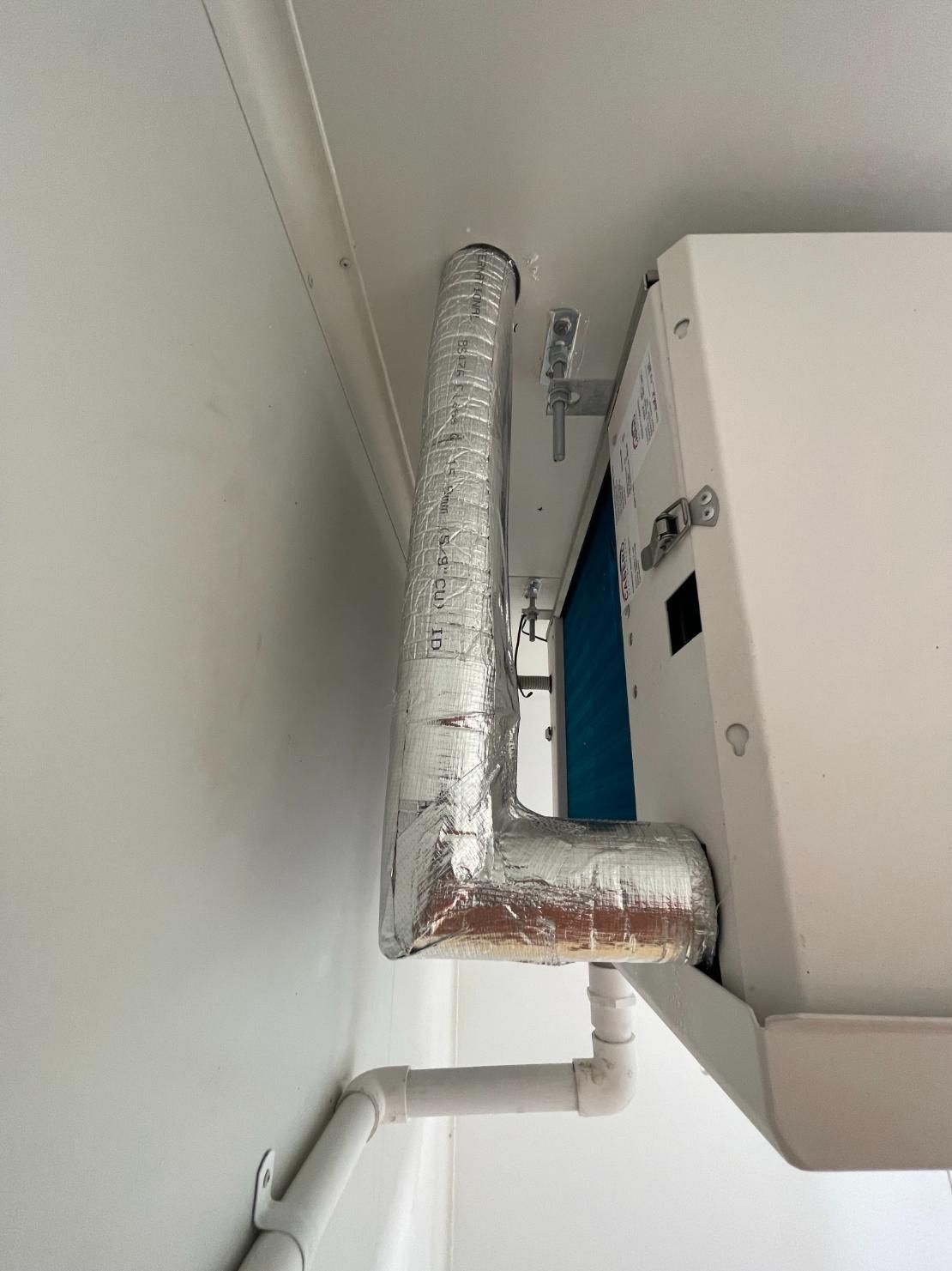 A Close Up of a Pipe Attached to a Wall — Condie Refrigeration & Air Conditioning In Pottsville, NSW