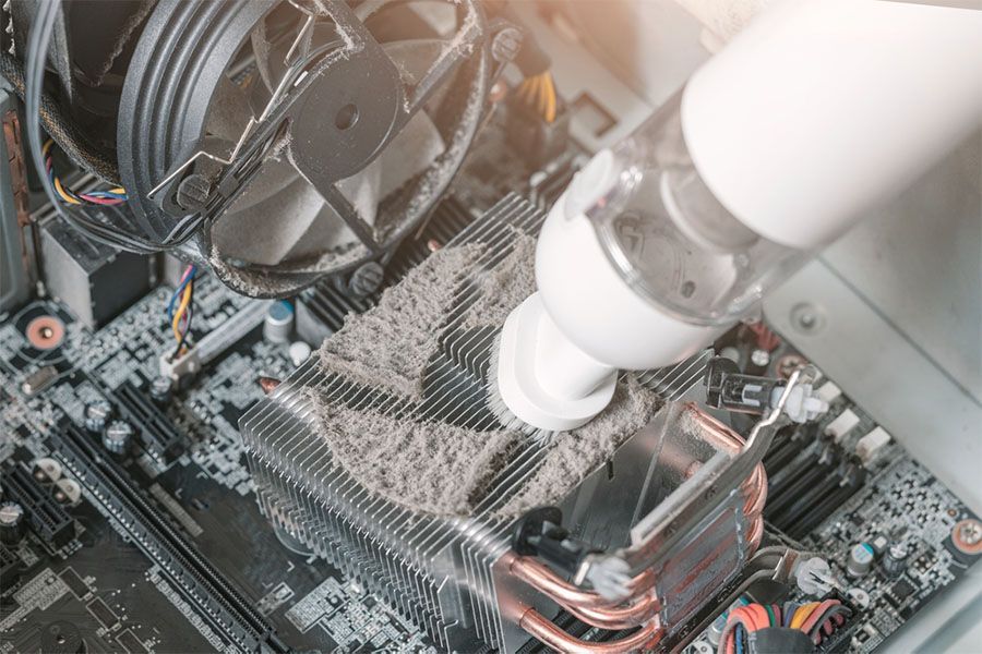 A bunch of wires are plugged into a router
