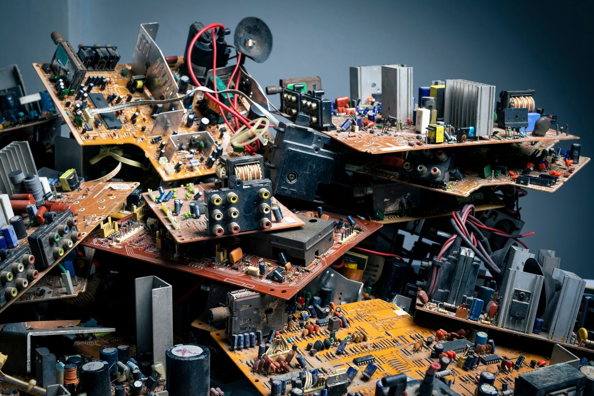 A bunch of wires are plugged into a router