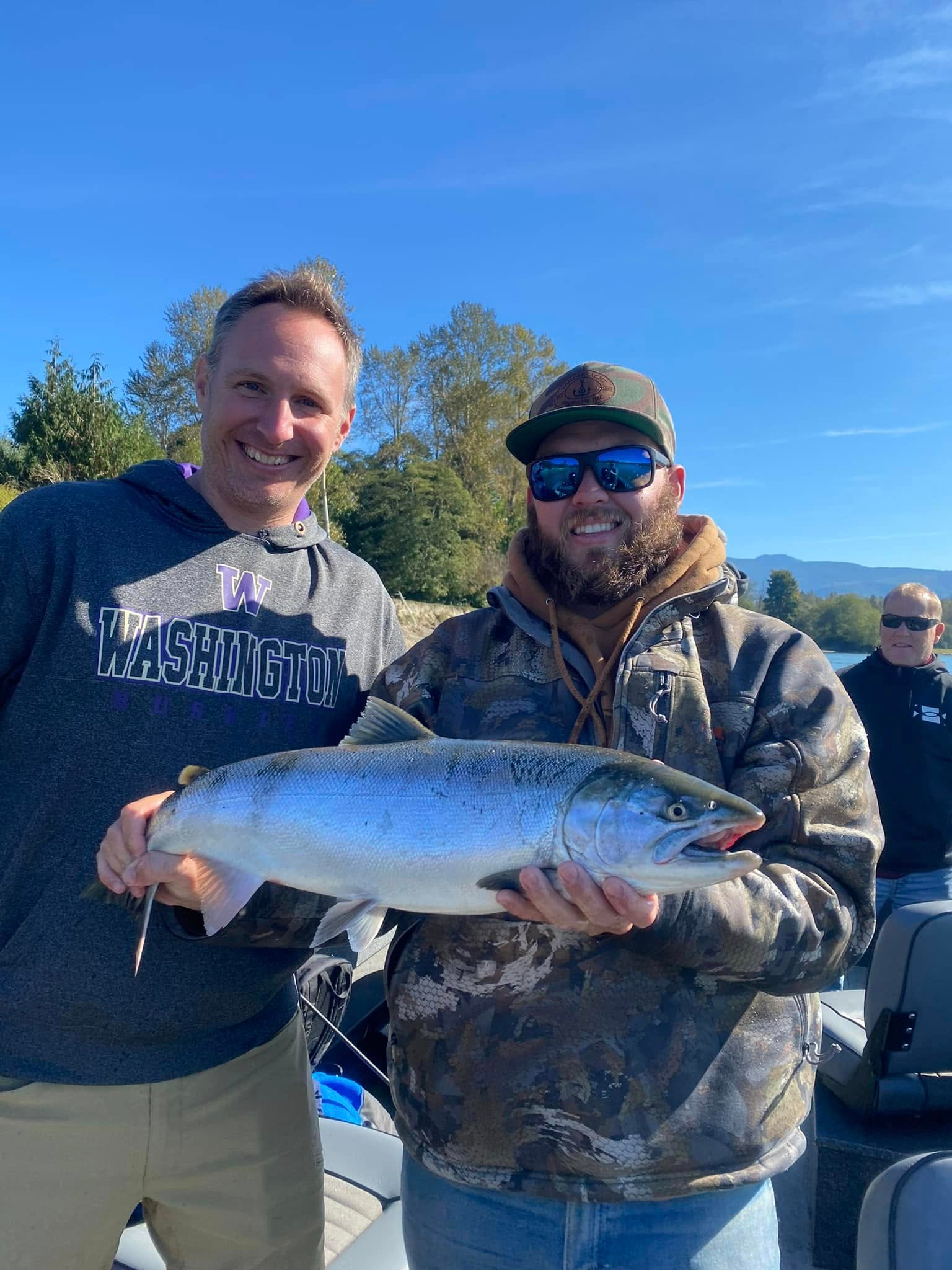 Guide and angler with fall coho salmon on Nooksack River
