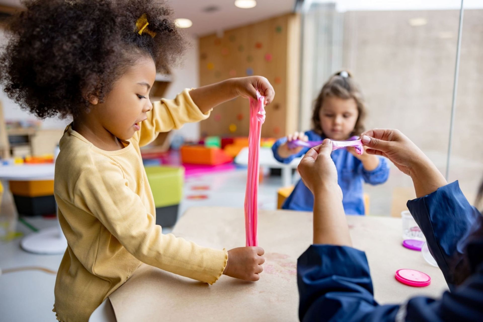 https://www.istockphoto.com/photo/girls-playing-with-slime-in-class-at-the-school-gm1402700285-455511074?phrase=kindergarte