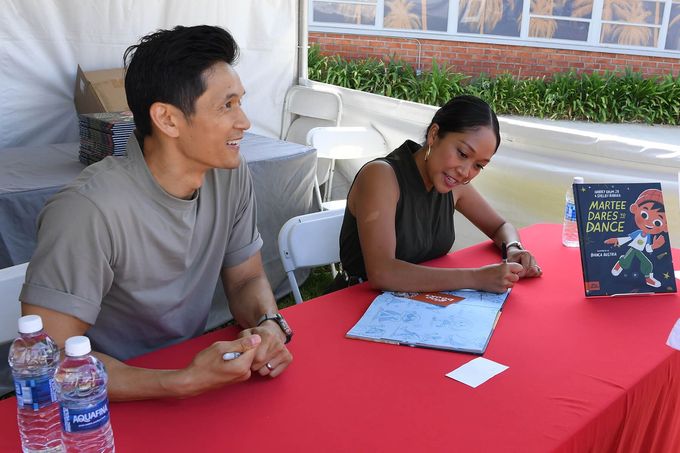 Harry Shum Jr and Shelby Rabara sign their new book. Text: Author and illustrator book signing opportunities.