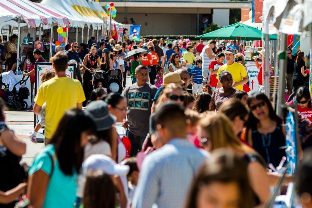 Festival attendees enjoy the many booths.
