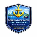 Shield-shaped logo for Toledo Locksmith, featuring a gold anchor-key hybrid over a cityscape, text, and phone number.