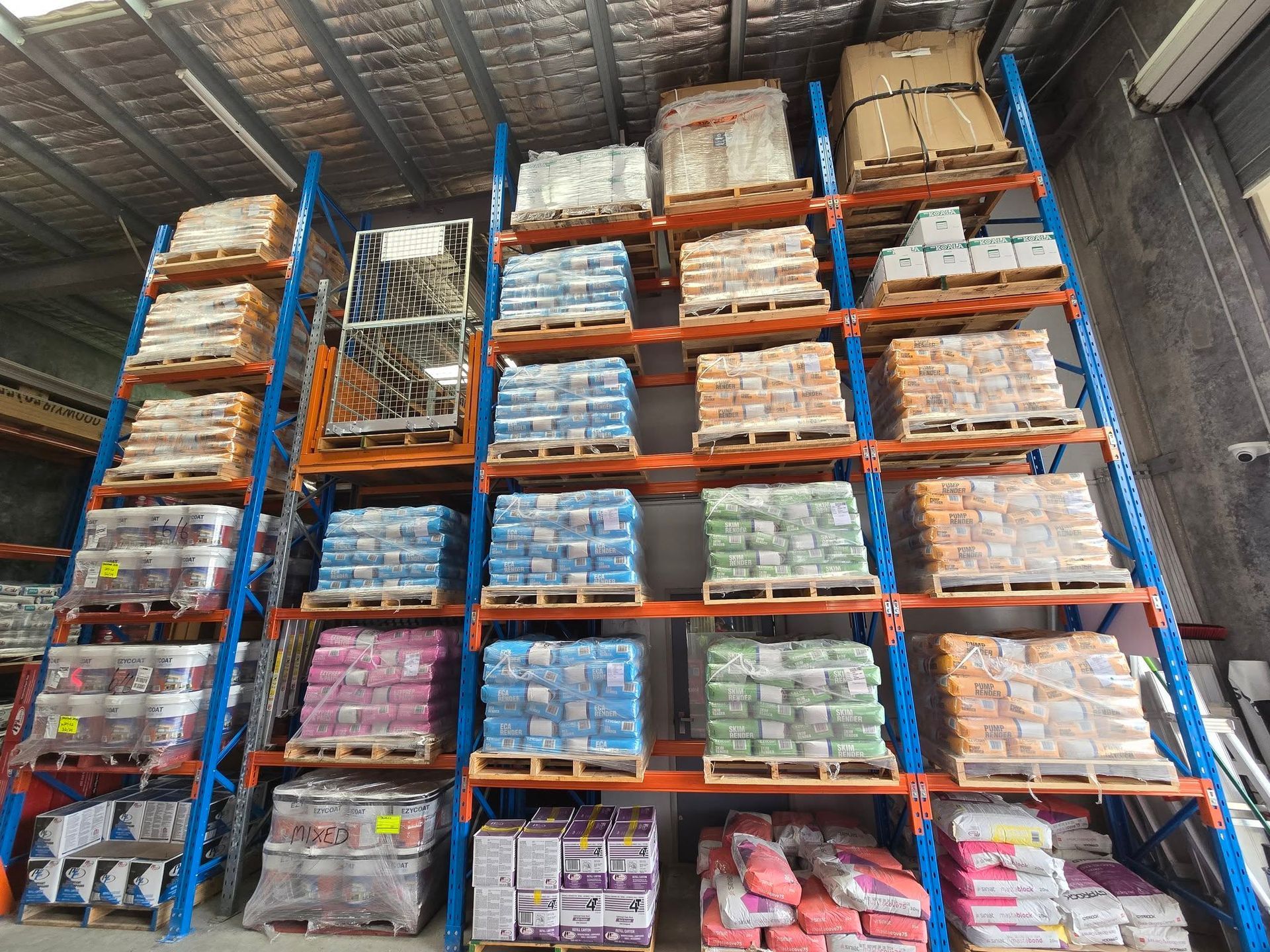 A warehouse filled with lots of pallets and shelves