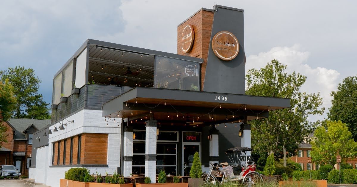 Exterior view of Rickshaw Thai Street Food restaurant in Alpharetta, GA with rooftop dining and mode