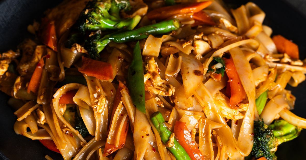 Thai stir-fried wide rice noodles with vegetables and egg from Rickshaw Thai Street Food in Alpharet