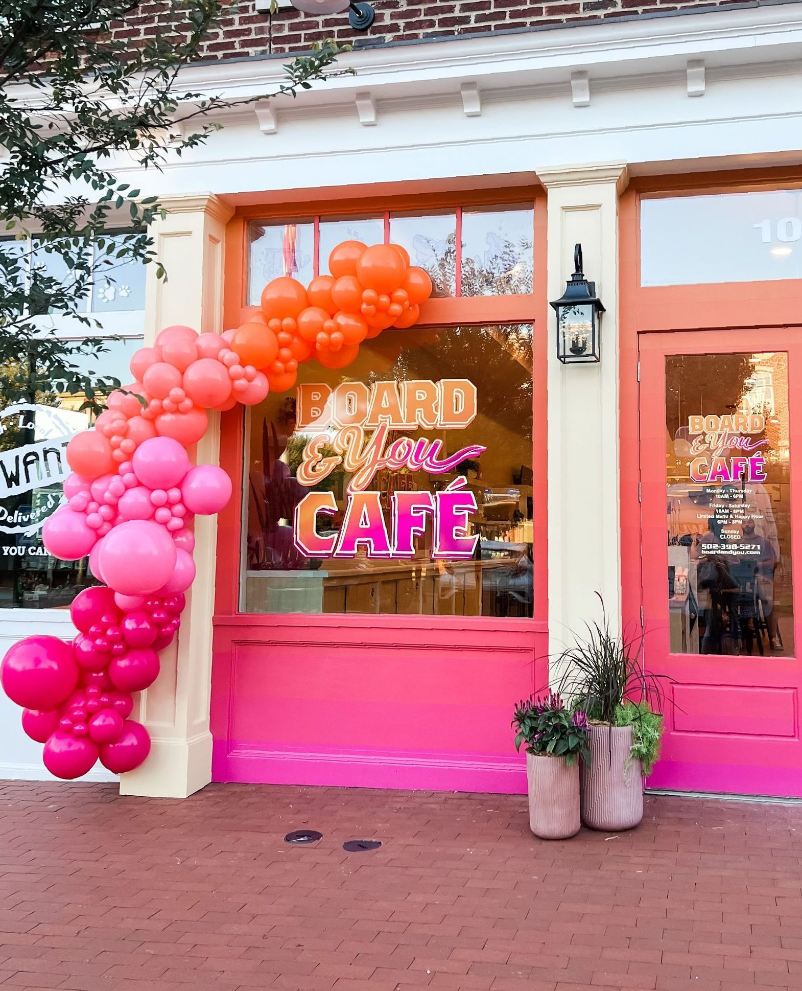 three balloons are stacked on top of each other in a room