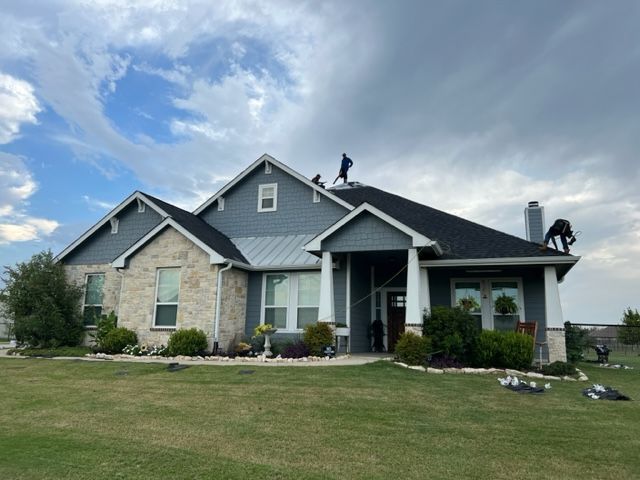 gray replacement roof by pro roofing and construction