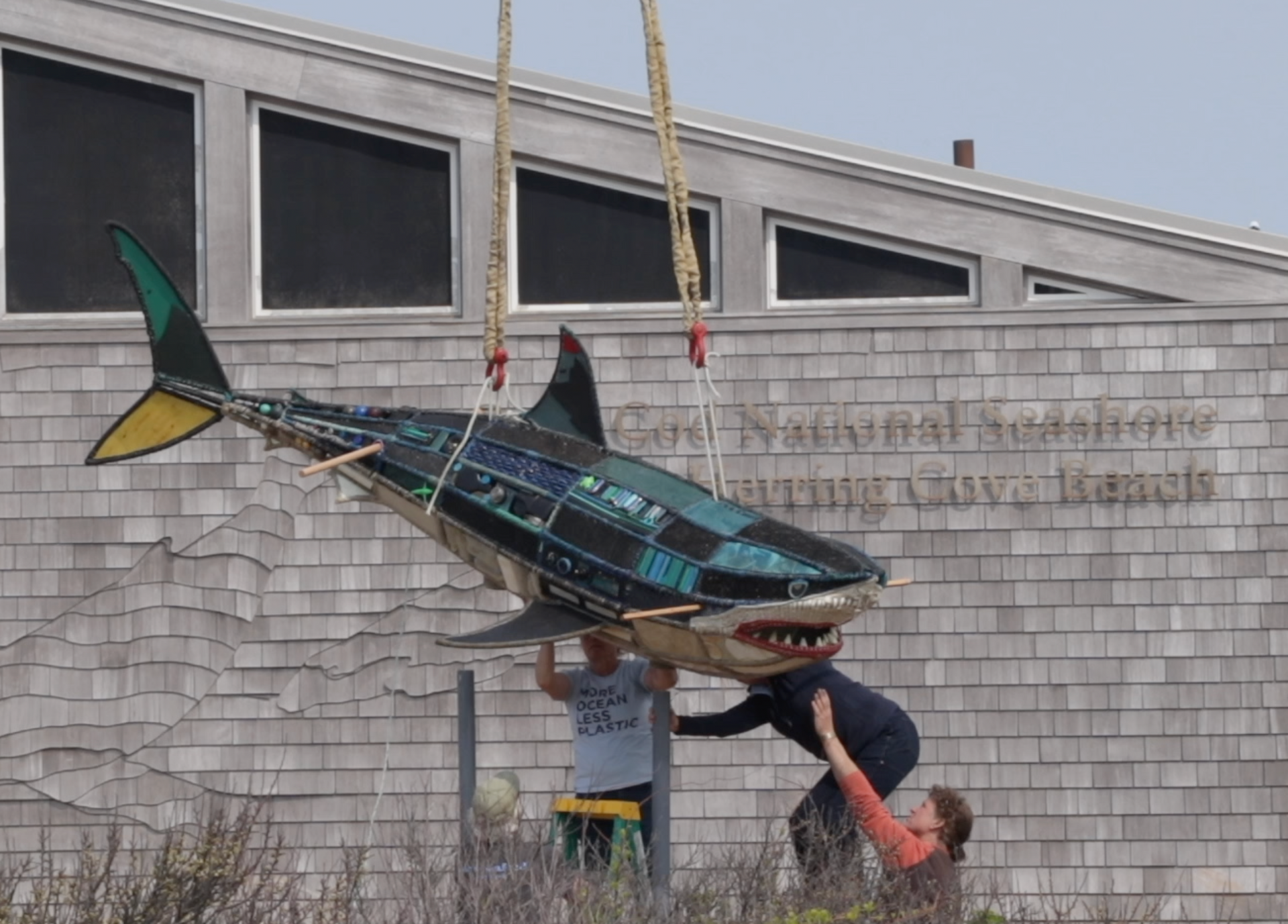 Cindy Pease Roe's sculpture made out of beach trash is installed in Herring Cove Beach in Ptown