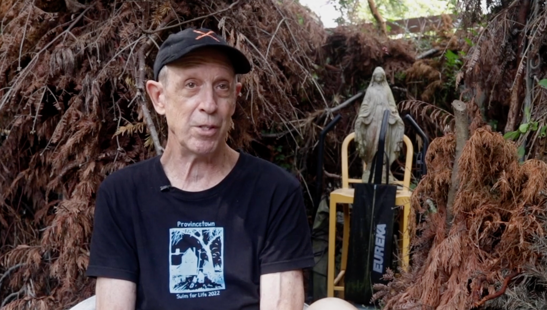Artist, activist, and writer Jay Critchley in his backyard art space in Provincetown