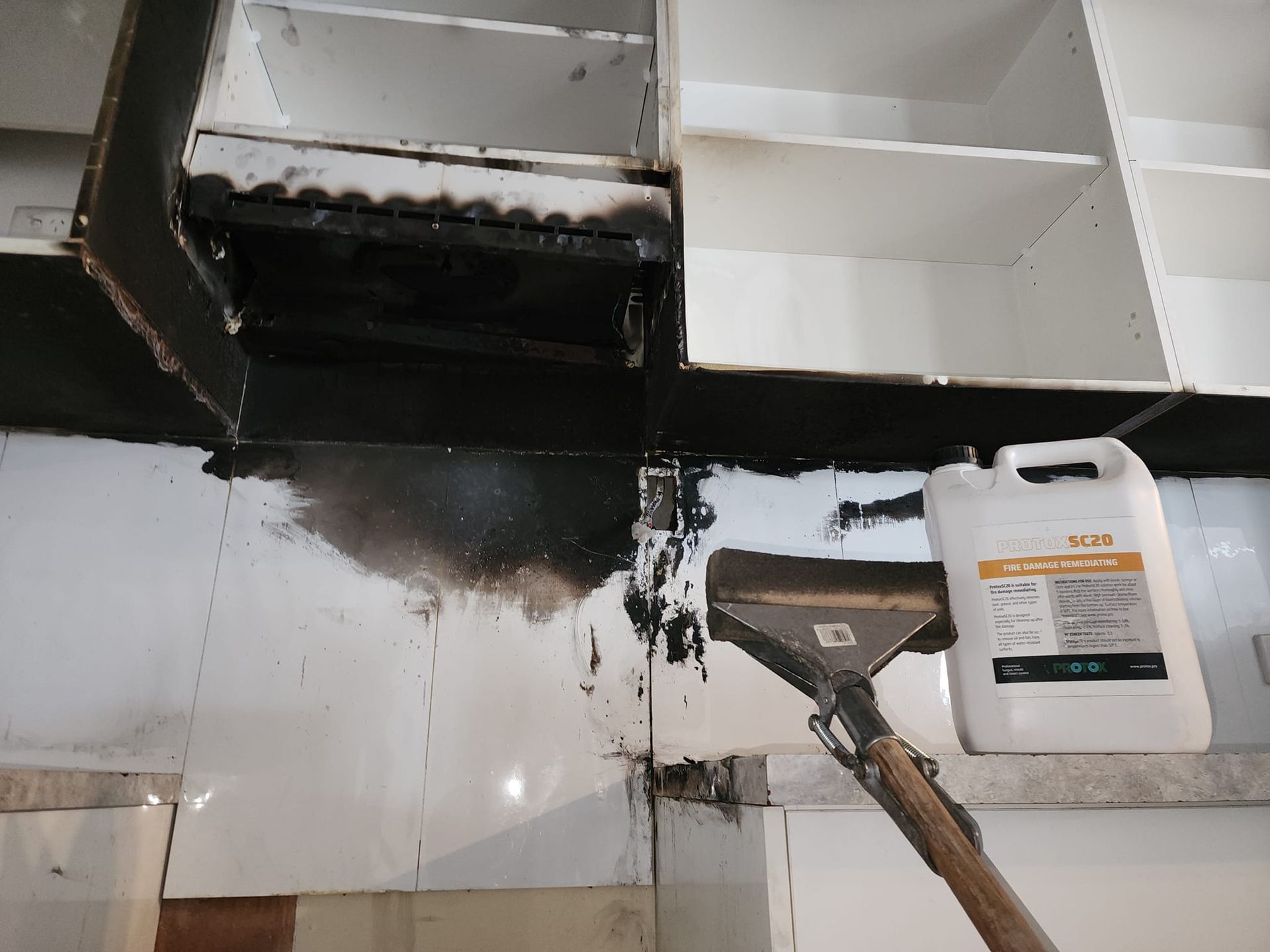 A Room in an Abandoned House With a Lot of Furniture and a Window — Dynamic Services in Limestone Creek, QLD