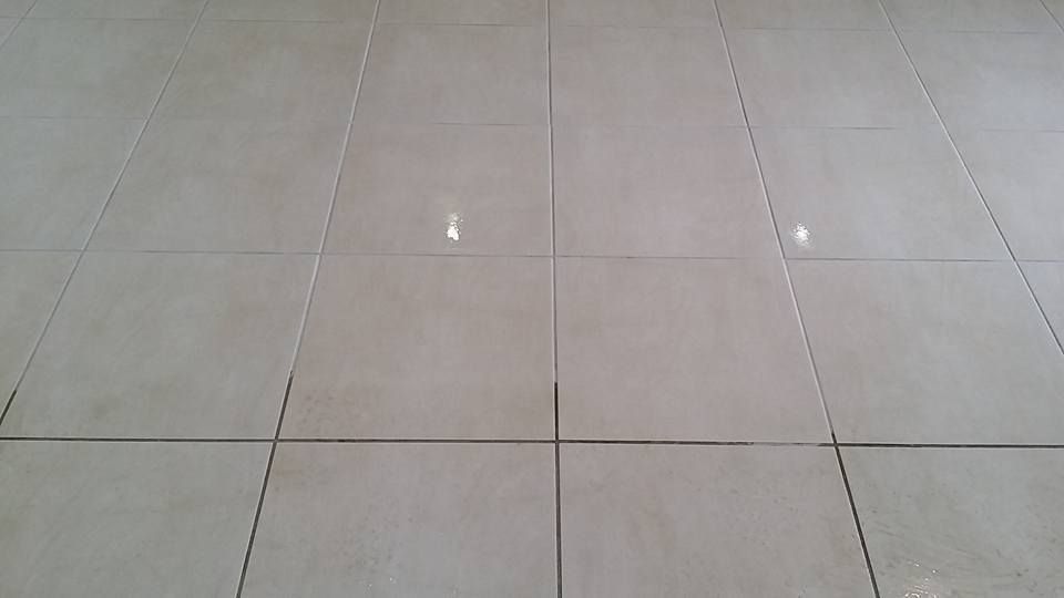 Light gray tiled floor.— Dynamic Services in Yeppoon, QLD