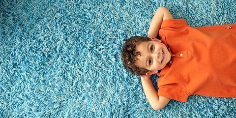 Carpet Cleaning Company — Boy on Carpet in North Charleston, SC