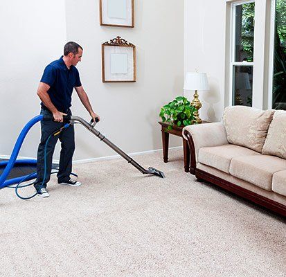 Residential Carpet Cleaner — Janitor Cleaning the Carpet in North Charleston, SC