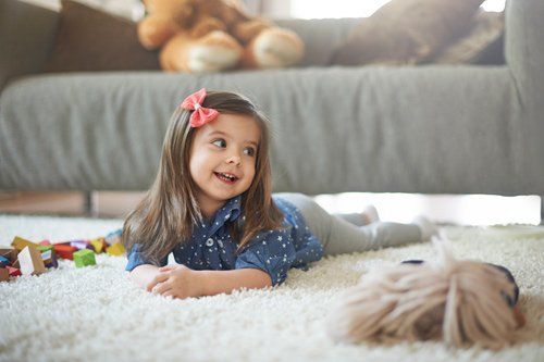 Carpet Cleaning Solution — Child Playing on Carpet in North Charleston, SC