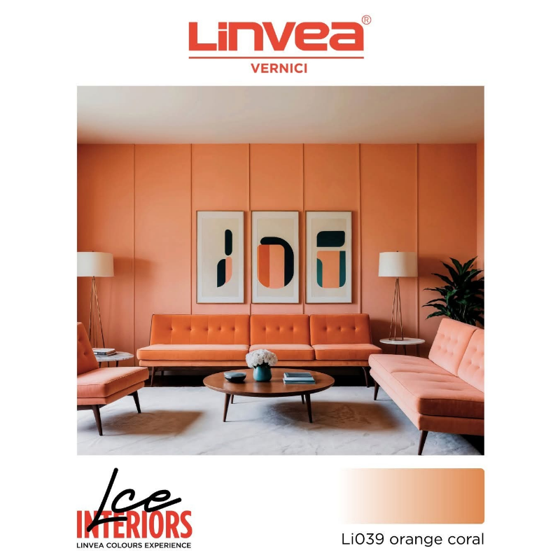 Soggiorno con pareti e mobili color corallo arancione; arte moderna e piante.